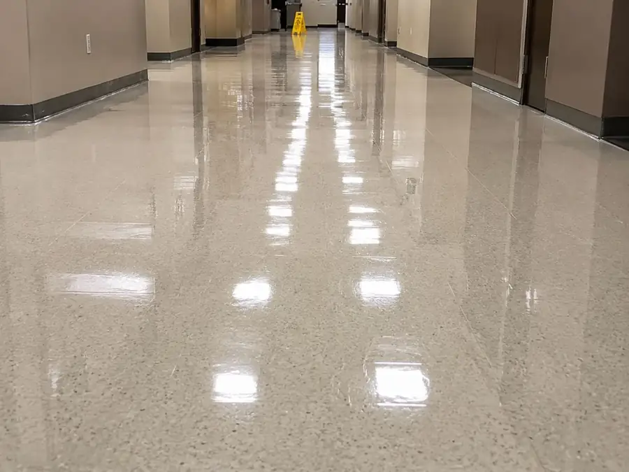 Commercial VCT floor freshly stripped and waxed to a high-gloss finish